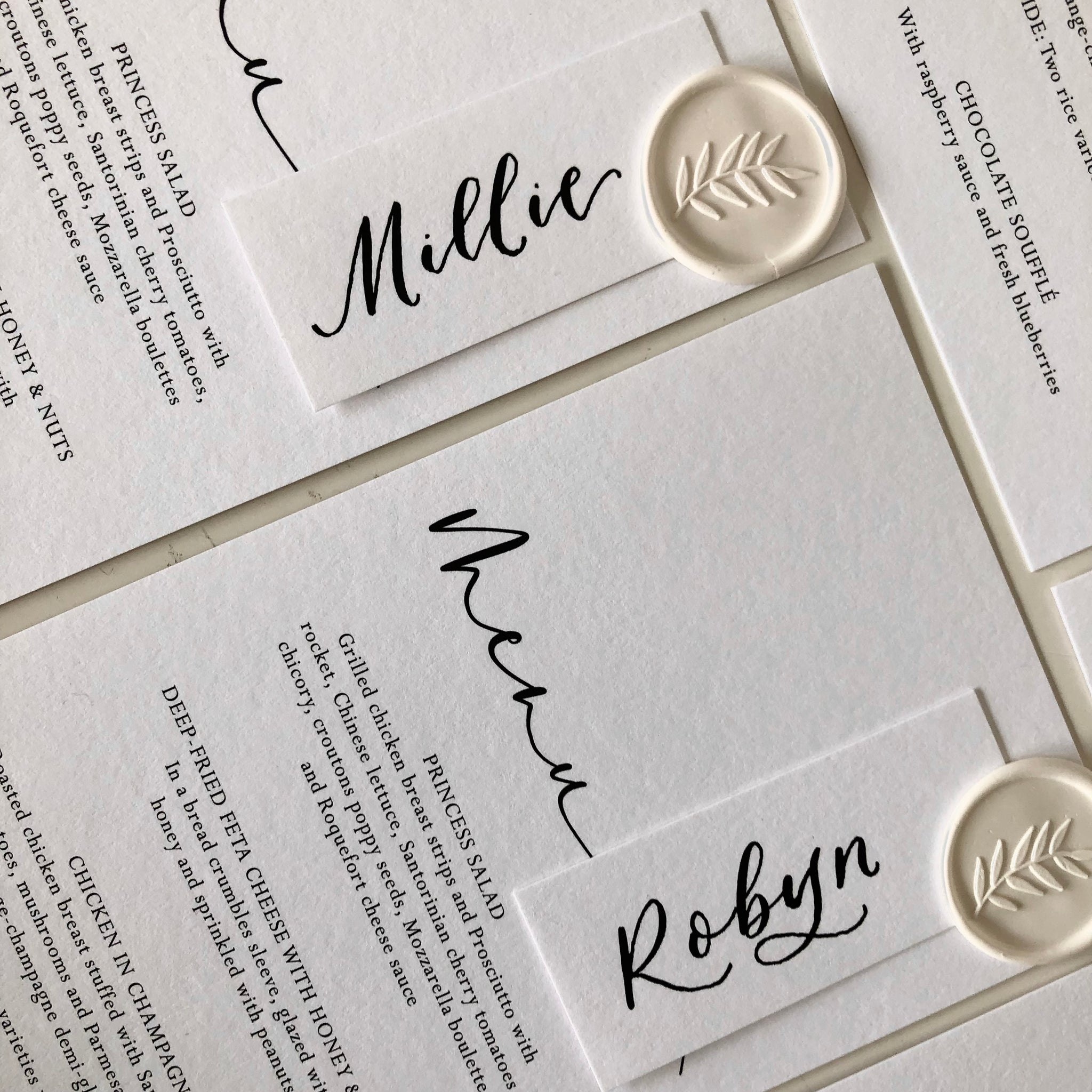 Wedding menu with wax seal and place card