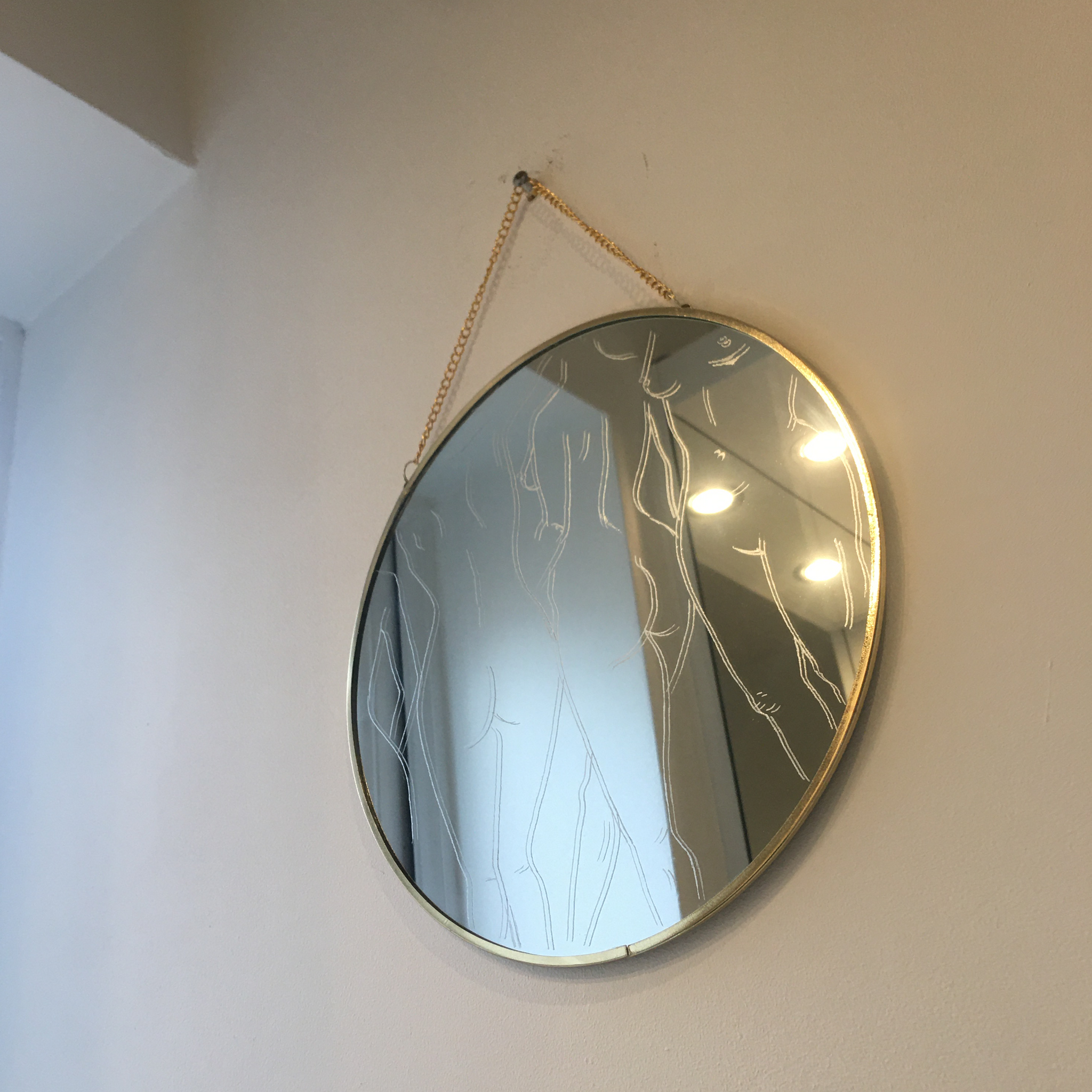 nude engraved mirror