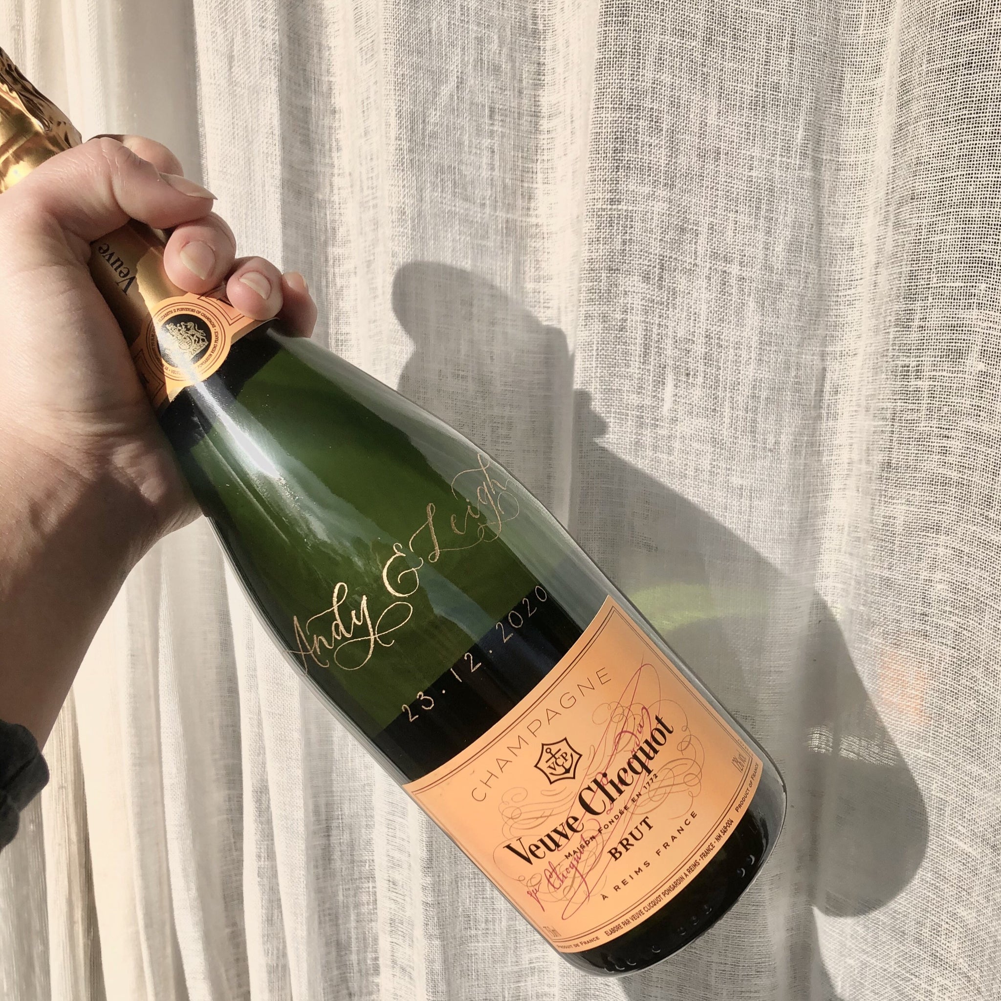 Engraved champagne bottle