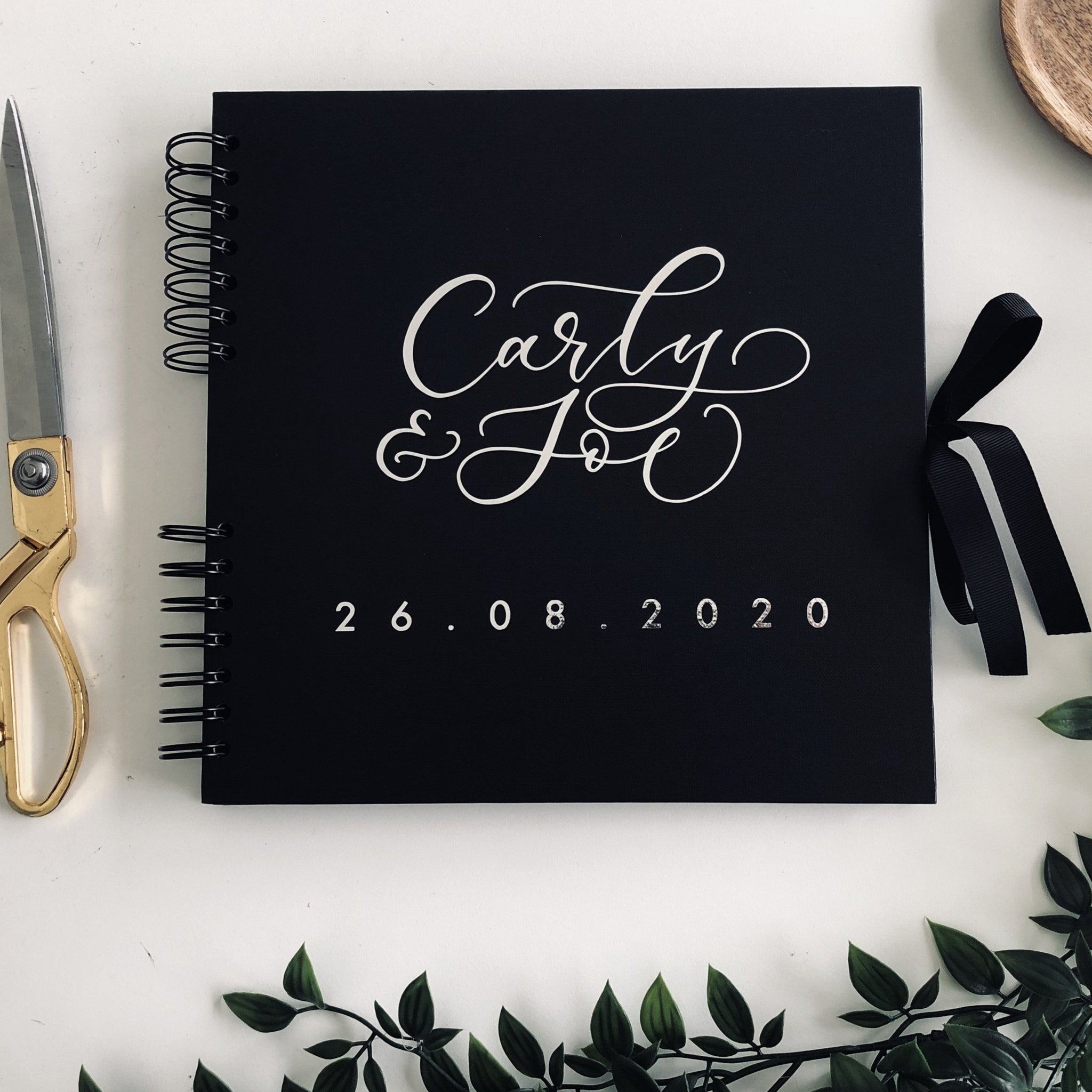 black and silver guest book