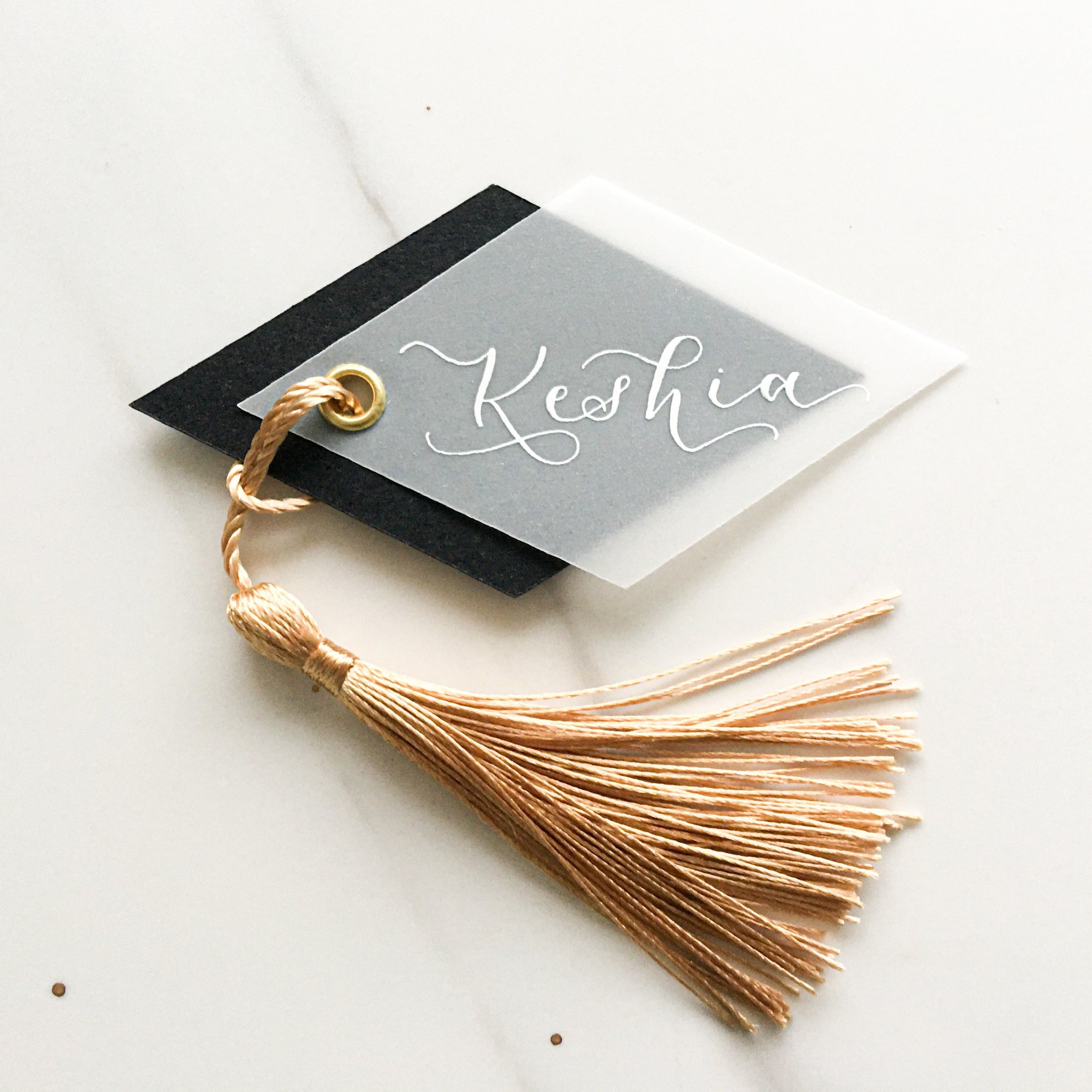 geometric place cards with tassel